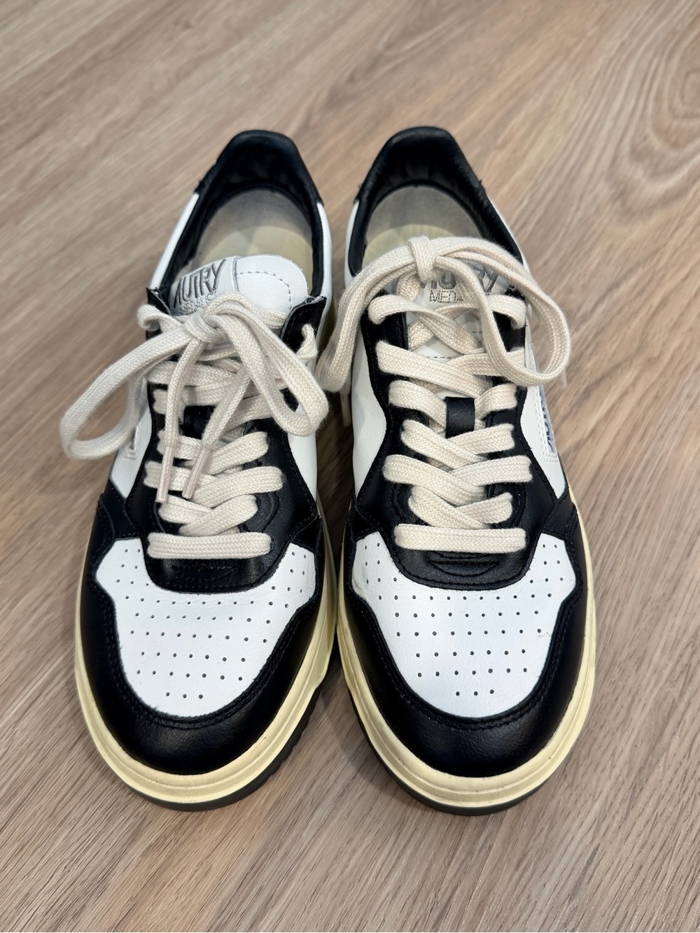 AUTRY Black and White Women’s Low-Top Sneakers with Cream Laces